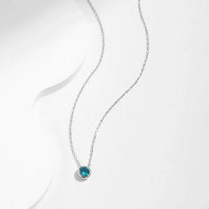 S925 sterling silver necklace with a round blue gemstone pendant on a fine silver chain