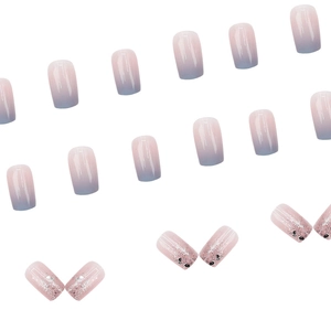 Short square baby blue gradient press-on nails with silver glitter and black dot accents