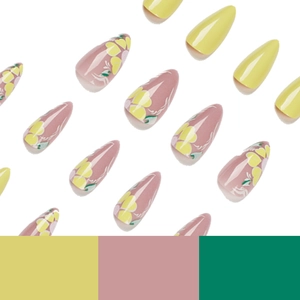 Glossy almond-shaped press-on nails featuring lemon yellow and floral heart patterns