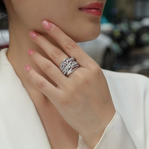 Elegant silver-colored wide band ring with multi-layer pave cubic zirconia gemstones