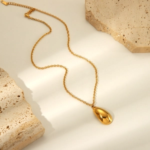 Elegant gold teardrop pendant necklace in polished stainless steel for women