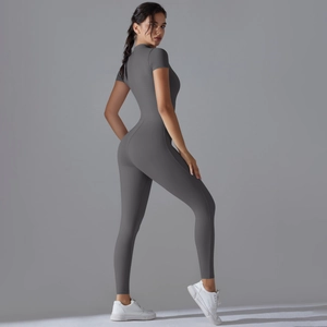 Side view of a dark grey high-elastic short-sleeved compression bodysuit for yoga fitness