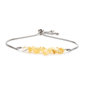 Detail of silver box chain bracelet with yellow crushed stones and heart charm