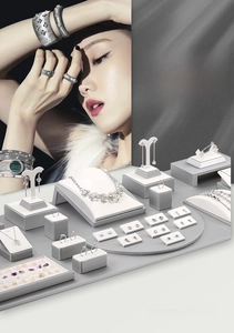 Silver grey jewelry display set with necklace stands and rings holders for showcase