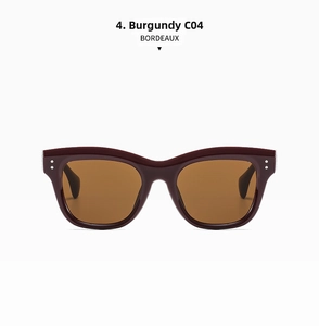 Detail view of Bordeaux square cat-eye frame with silver rivets and dark brown lenses
