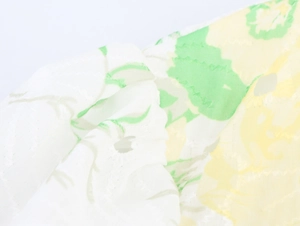 Detail of floral embroidery and breathable woven texture on this summer V-neck dress