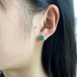 Side view of s925 sterling silver studs featuring a rectangular green zircon stone