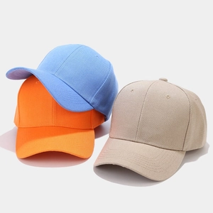 Classic cotton baseball caps in blue, orange and khaki with minimalist curved brim
