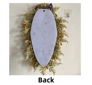 Detail of the back felt base with hanging hole on a purple hydrangea wall decor piece