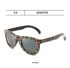 Detailed 45-degree side view of children giraffe pattern sunglasses with dark grey lenses