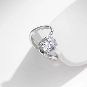 S925 sterling silver ring featuring a sparkling oval zircon in a modern fluid design
