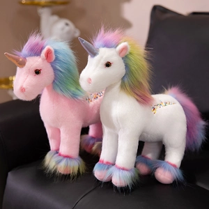 Pink and white unicorn plush toys with rainbow manes and sparkly horns for kids