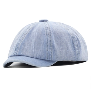 Light blue denim short brim docker cap with classic six-panel design and stitch detail