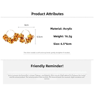 Detailed view of leopard print acrylic C-hoop earrings with 6.5x6cm size specifications