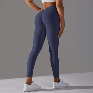 High-waist scrunch butt yoga leggings in deep blue, showcasing stretch and lifting fit