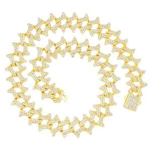 Golden iced-out Cuban link chain with rhombic diamonds and secure rectangular clasp