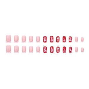 Christmas press-on nails set with red snowflakes and reindeer designs on a white background