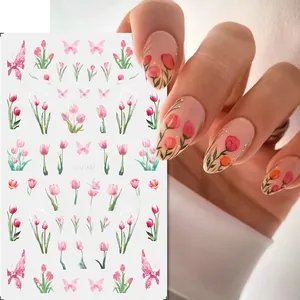 Detail of tulip and butterfly nail stickers F1027 showing sheet and hand application