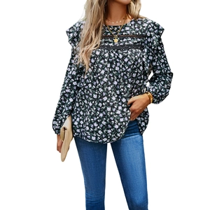 Women's floral long sleeve blouse with ruffles and lace stitching on black fabric
