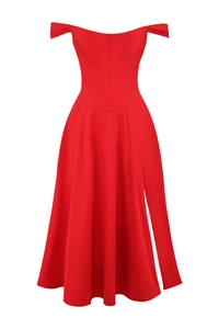 Detail showing red off-shoulder midi dress with corset-style waist and flowing split hem