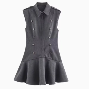 Fashion sleeveless charcoal mini dress with shoulder pads, buttons, and fishtail hem