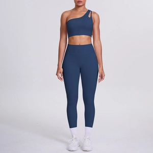 Navy blue one-shoulder sports bra and high-waisted leggings set for yoga and fitness