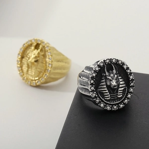 Macro shot of a vintage Egyptian Sphinx ring with inlaid rhinestones and detailed engraving
