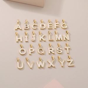 Set of 26 English letter pendants with white shell inlay and 18K gold plated borders