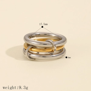 Detail view of multi-layer mixed gold and silver stainless steel rings with size dimensions