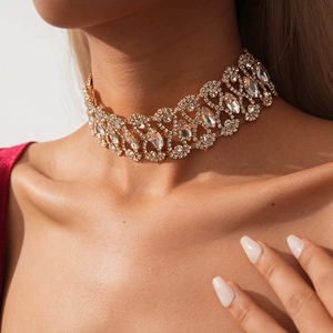 Macro detail of luxury geometric hollow choker featuring sparkling crystal diamonds