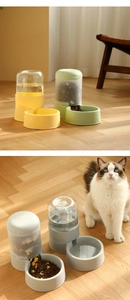 Dual pet automatic feeder and waterer set shown in vibrant green and grey colors