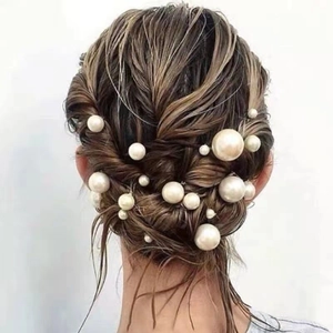 Bridal hair pins with various sizes of white pearls for elegant wedding hairstyles