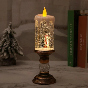 Christmas water candle lantern with snowman and glitter in a vintage gold base