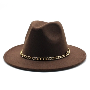 Professional close-up view of a classic brown felt fedora hat with gold chain detail