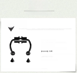 Detail view of black horseshoe magnetic septum ring with ball and cone replacement ends