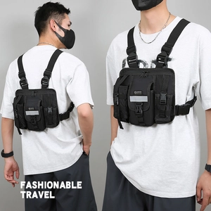 Front and back view of a black nylon tactical chest bag with adjustable straps for men