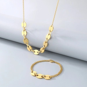 Polished gold stainless steel jewelry set with oval link necklace and double-layer bracelet