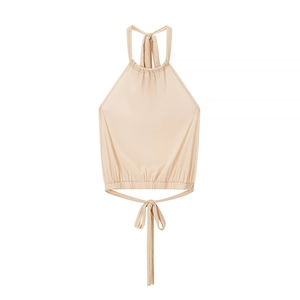 Detail of nude halter neck top featuring adjustable drawstring ties and knitted texture