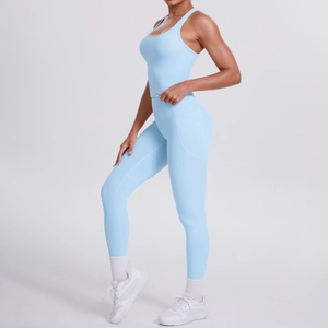 Women's light blue yoga set with racerback tank top and high-waisted side pocket leggings