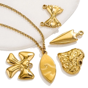 Golden titanium steel geometric pendant set with necklace featuring bow and heart shapes