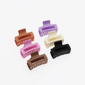 Set of six matte rectangular hollow hair claws in various Morandi colors on white back