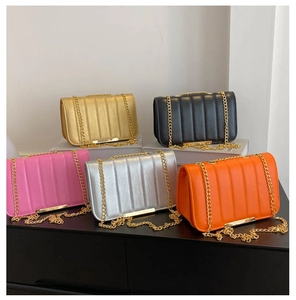 Chic quilted chain shoulder bags shown in gold, black, pink, silver, and orange colors
