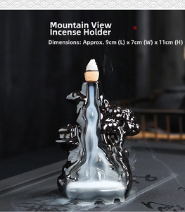 Macro shot of mountain peak ceramic incense burner with waterfall smoke 9x7x11cm