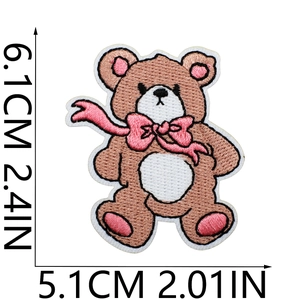 Detailed size view of brown bear embroidery patch with pink bow and precise dimensions