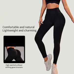High-waisted seamless black yoga pants with peach lift design for fitness and gym wear