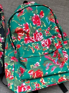 Traditional green floral pattern backpack with red peonies and phoenix design for travel