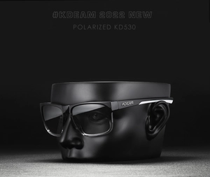 Close-up of polarized lenses and sleek black frame on KDEAM KD530 sports sunglasses