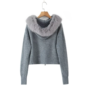 Detailed knit texture of grey zip cardigan featuring a plush faux fur collar trim