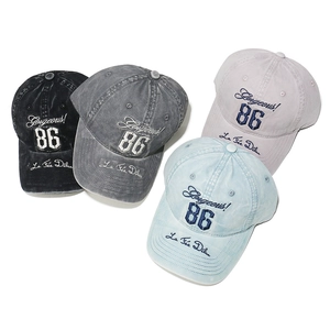 Collection of washed cotton baseball caps with 86 embroidery in four vintage colors