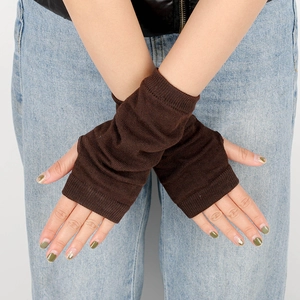 Close-up of brown ribbed knit arm warmers with a fingerless design for versatile wear